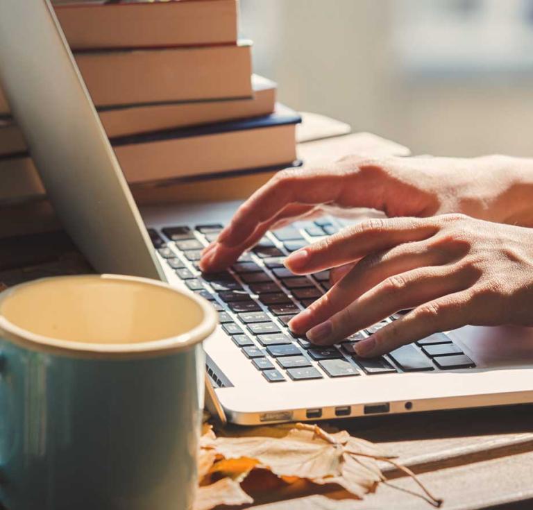 Computer with books